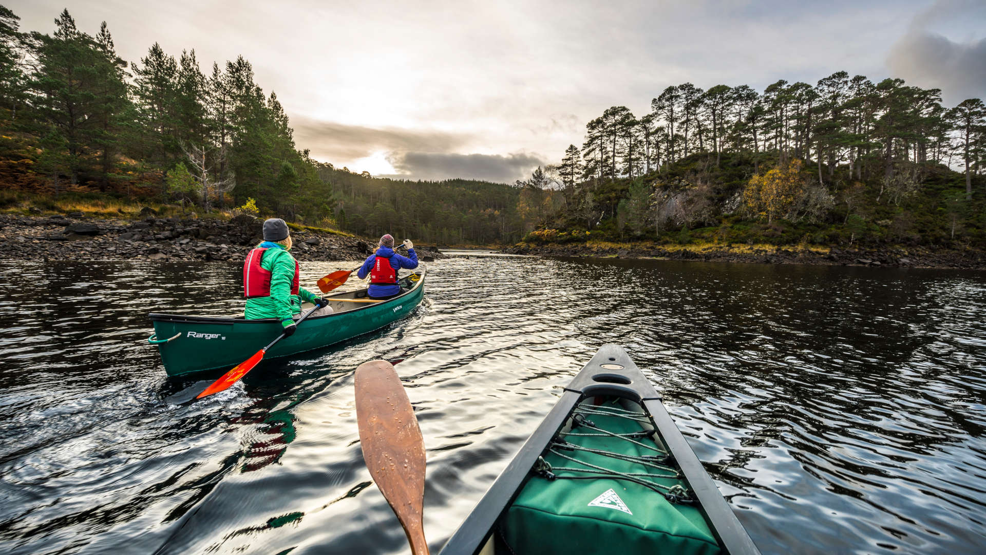 Image of two canoes on the river