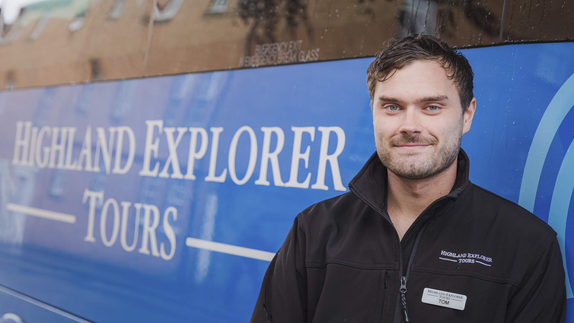 Photo of highlander explorer tours bus and driver 