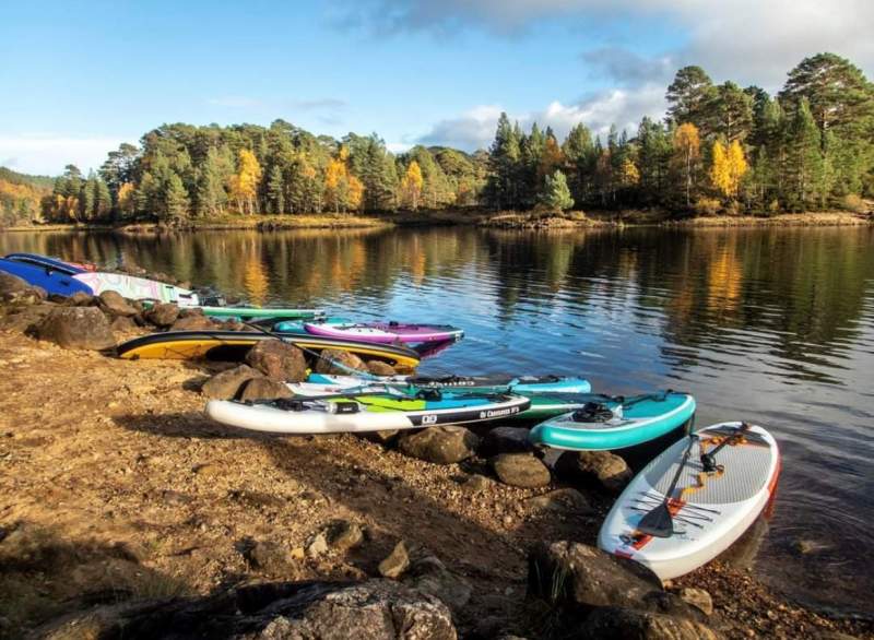 paddleboards on a loch