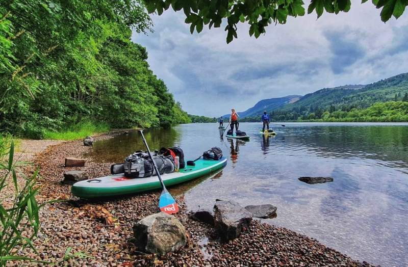 paddleboards on a loch