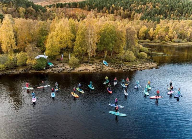 paddleboards on a loch