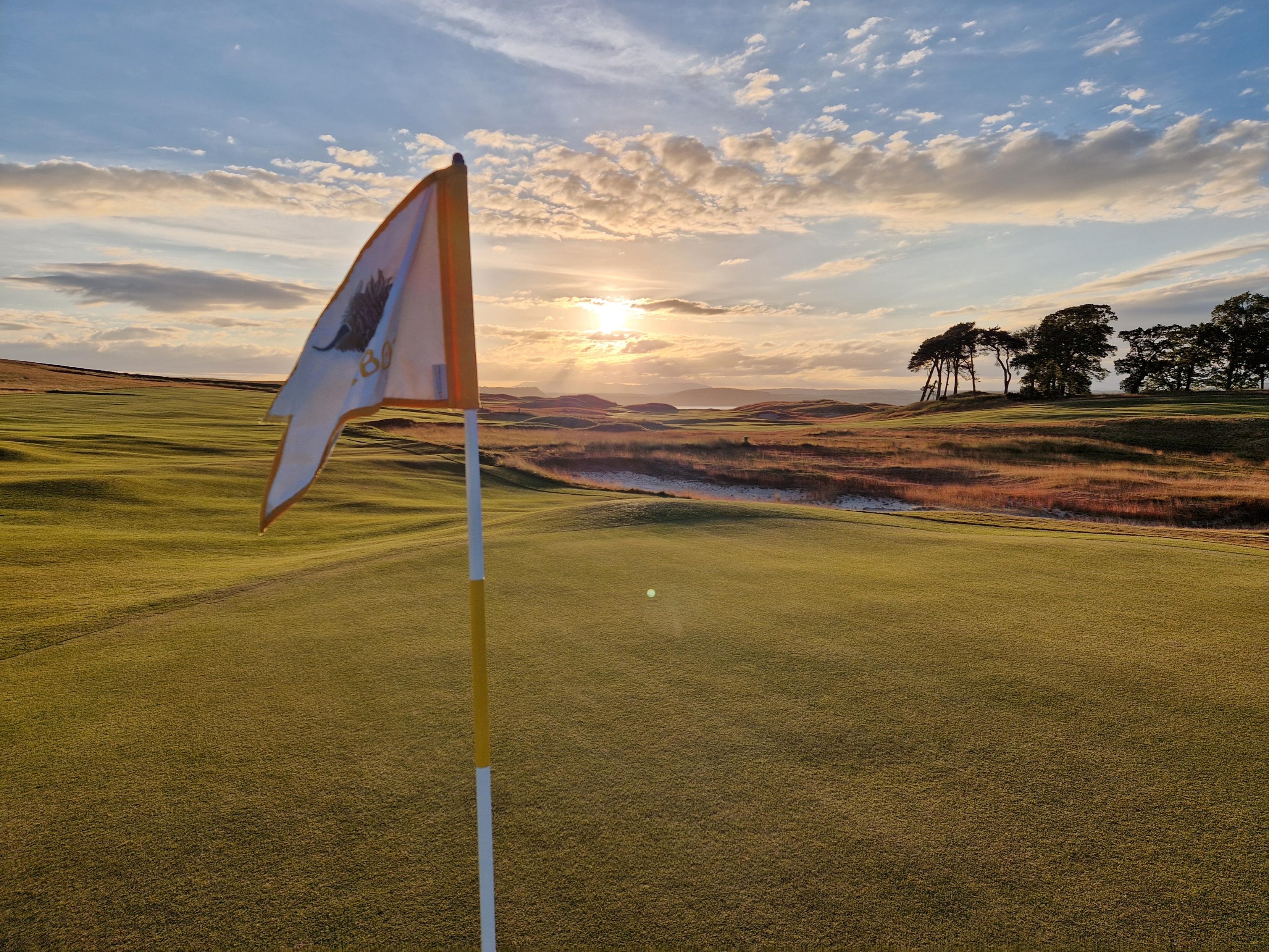 sunset over Old Petty from 9th green by Ian Ferrier